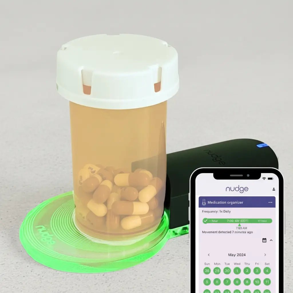 Nudge Medication Tracking Device With App Shown